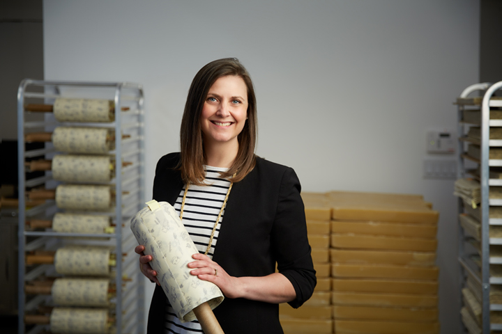Toni Desrosiers, founder and CEO of Abeego, holding a beeswax food wrap