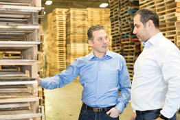 Raed Bechara, founder of Industrie de Palettes Standard (IPS), showing his materials