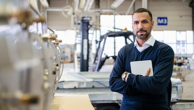 man standing in a factory