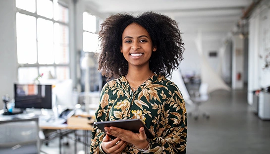 businesswoman reading a BDC ebook on her tablet