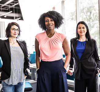 three businesswomen in their office