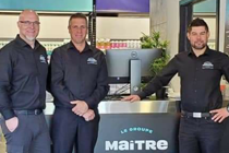 Martin Contant, co-owner of Evasion Piscine et Spa, with two other employees in their store
