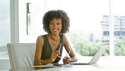 Woman smiling in an office