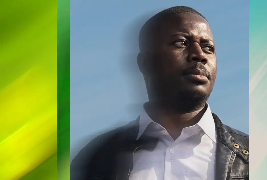 Harvest Recycling owner wearing a leather jacket looks to the right