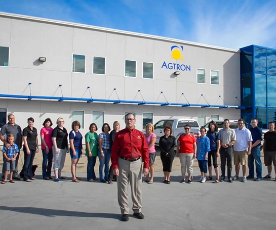 Bill Baker, founder and CEO of Agtron Electronics, with his team members