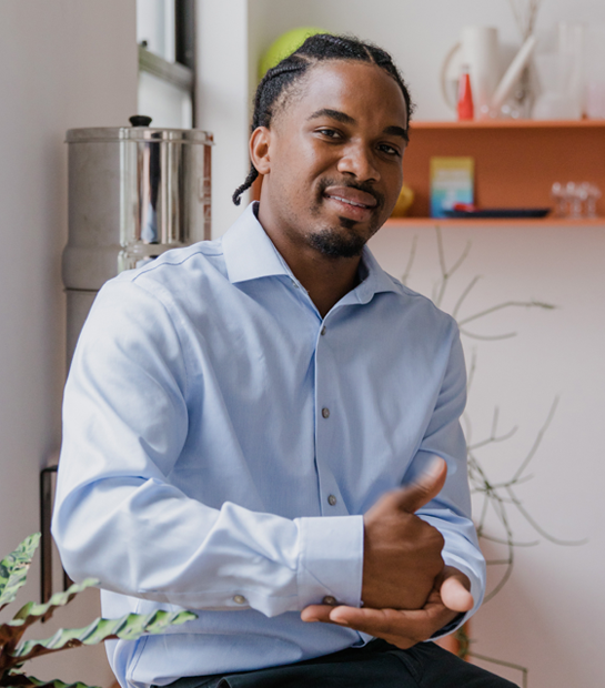 hearing impaired black man signing help you in his office