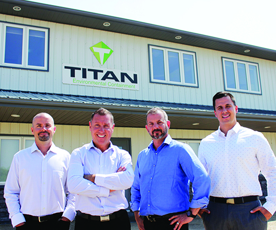 Brett Burkard, CEO of Titan Environmental Containment, with three of his colleagues