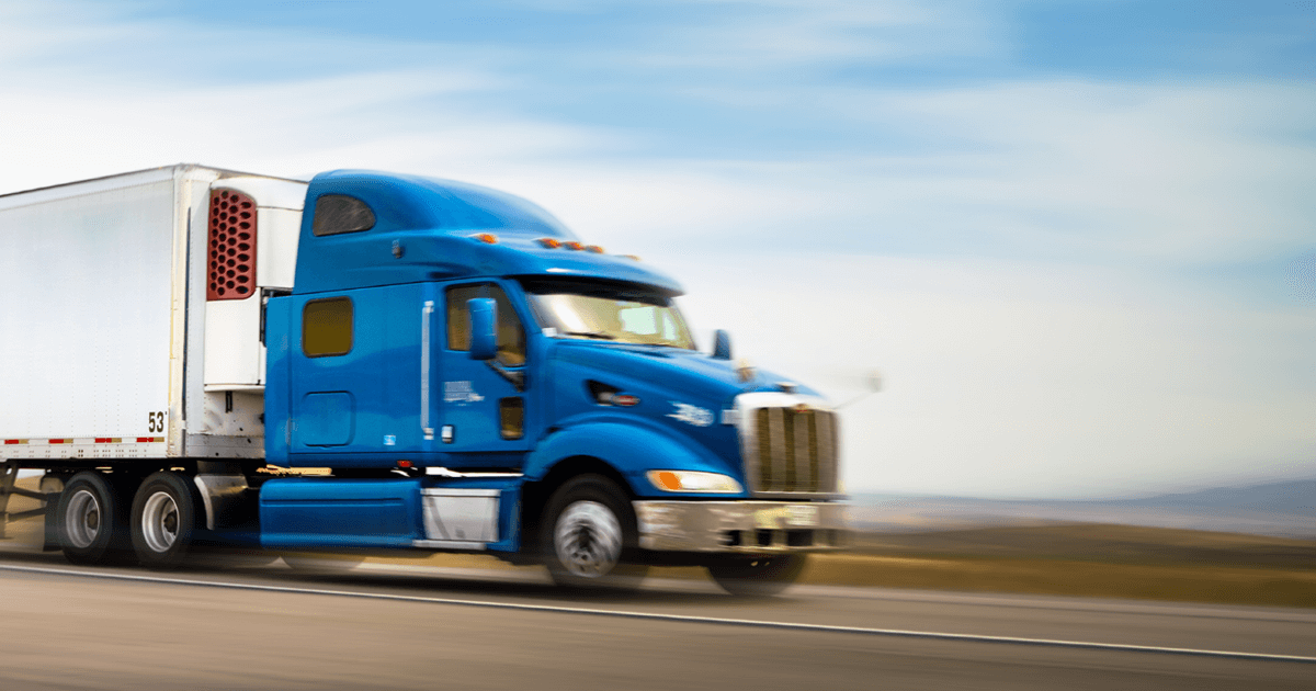 blue truck in movement
