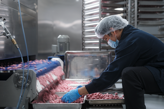 men working in a candy factory