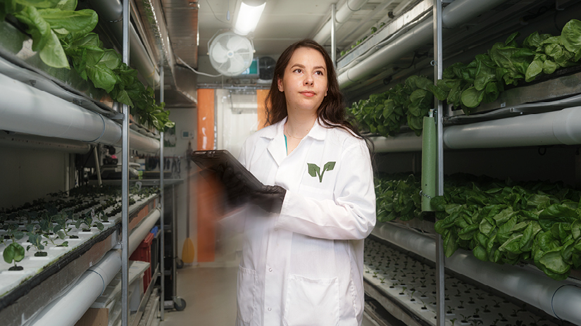 Alida Burke, The Growcer owner, surrounded by plants