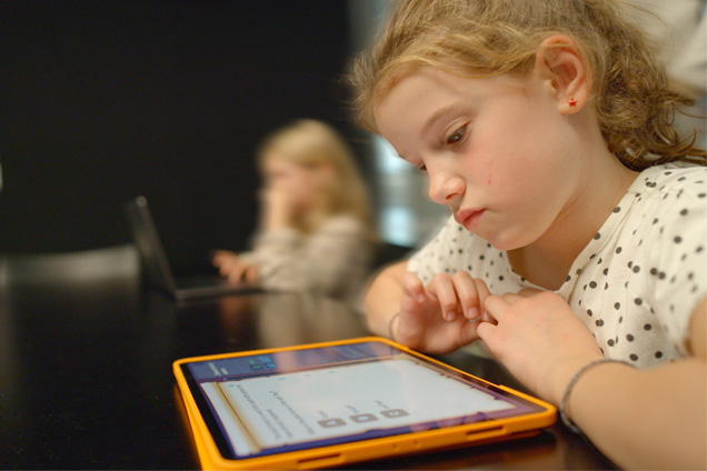 child using Shoelace Learning software on tablet