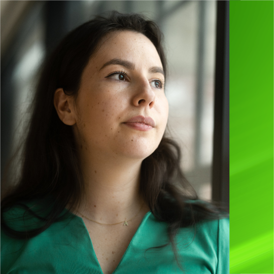 Businesswoman staring out of a window