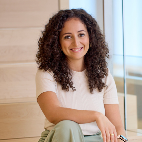 Portrait of a bdc employee in front of a staircase