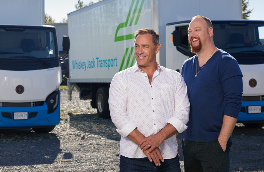 Co-owners Gilles Laplante and Richard Greenhalgh with EV trucks