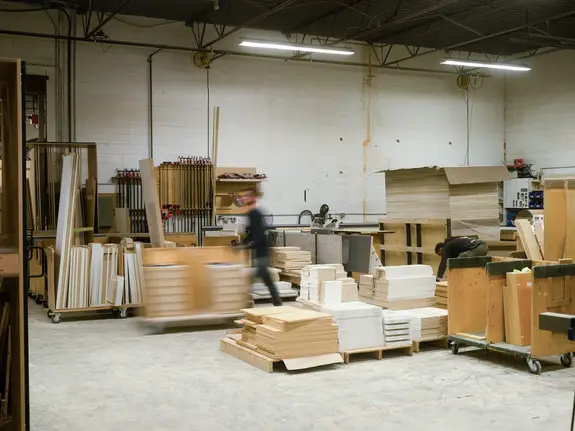Millwork Innovations employee working in a warehouse