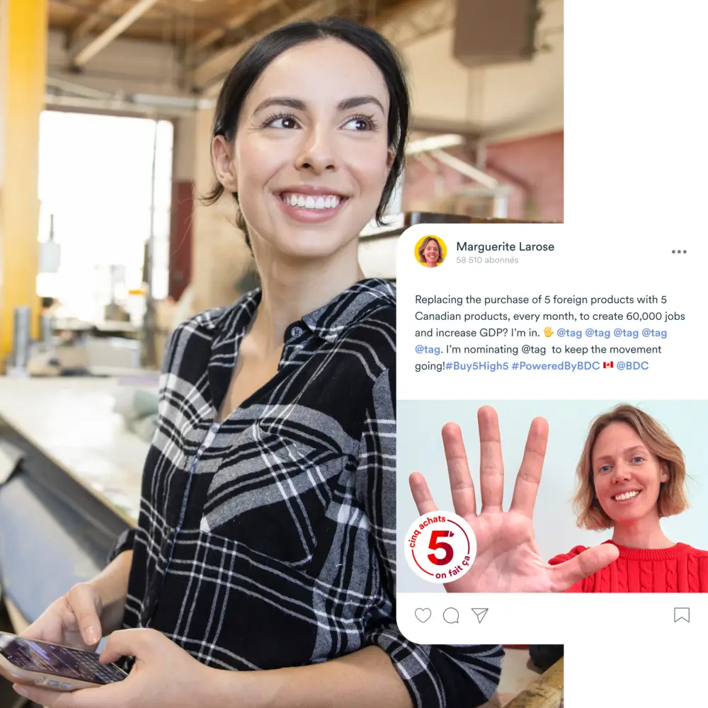 Woman smiling and holding up her hand