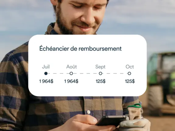 Un homme tenant un téléphone