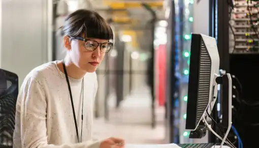 server room technician wearing glasses