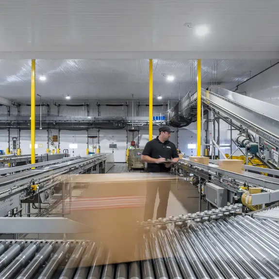 employee at RDL Transport working in the warehouse